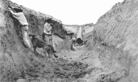 Laying pipe in the late 1800s.